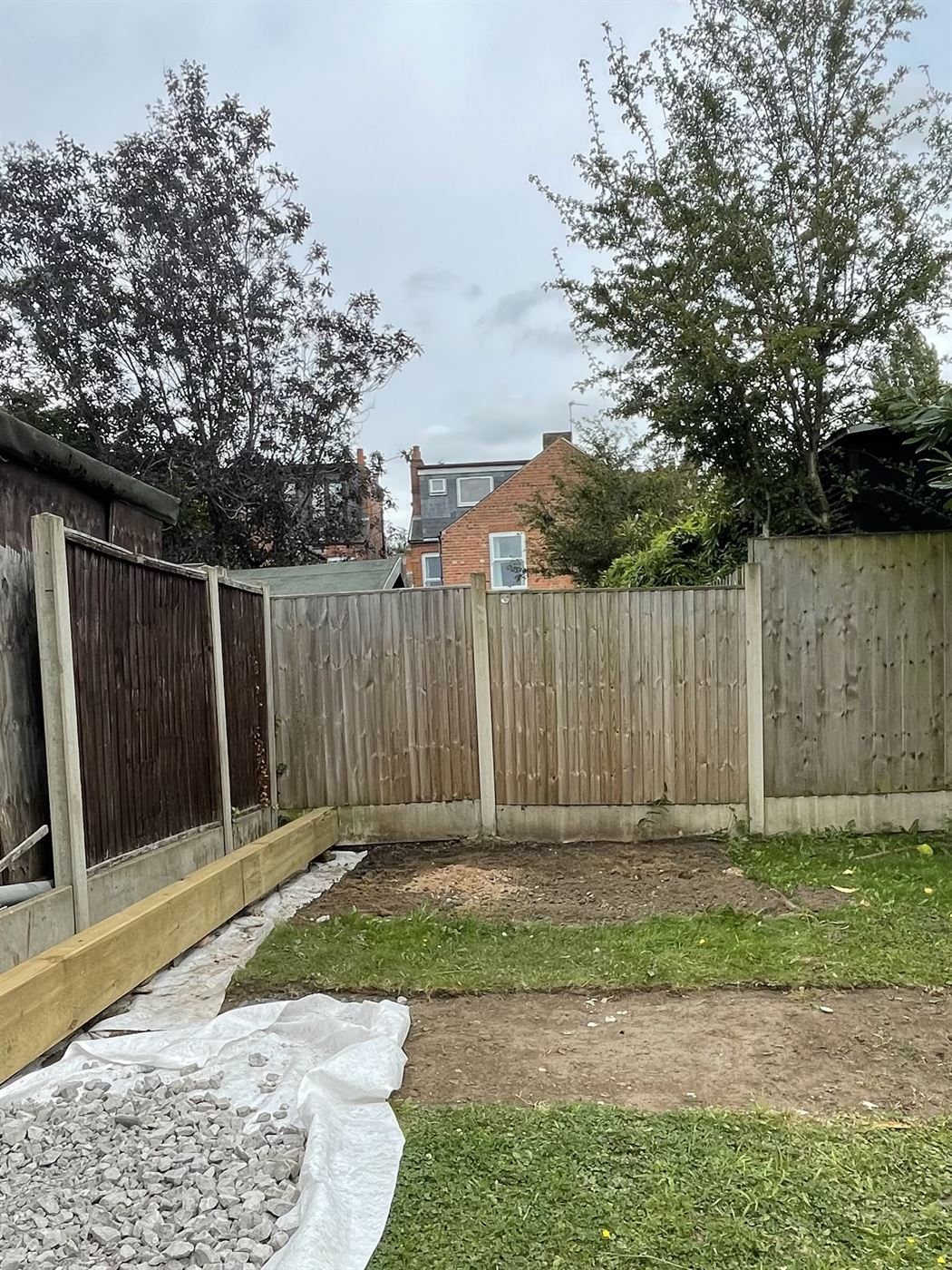 The same spot after the shed was taken down, every material removed and the ground left clear