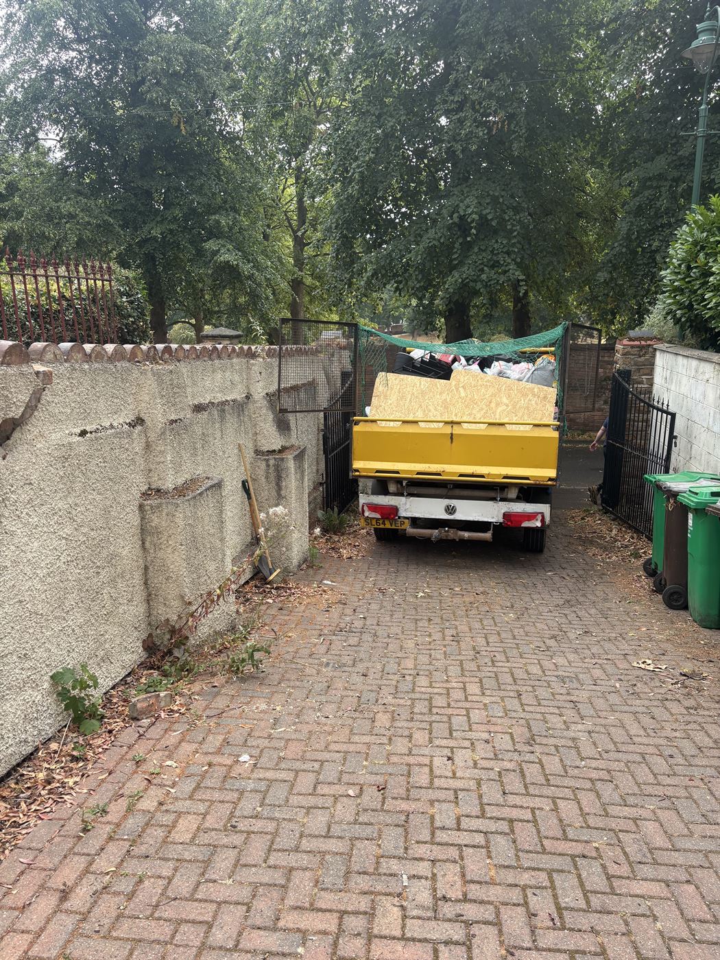 The same house clearance finished, the driveway cleared and swept