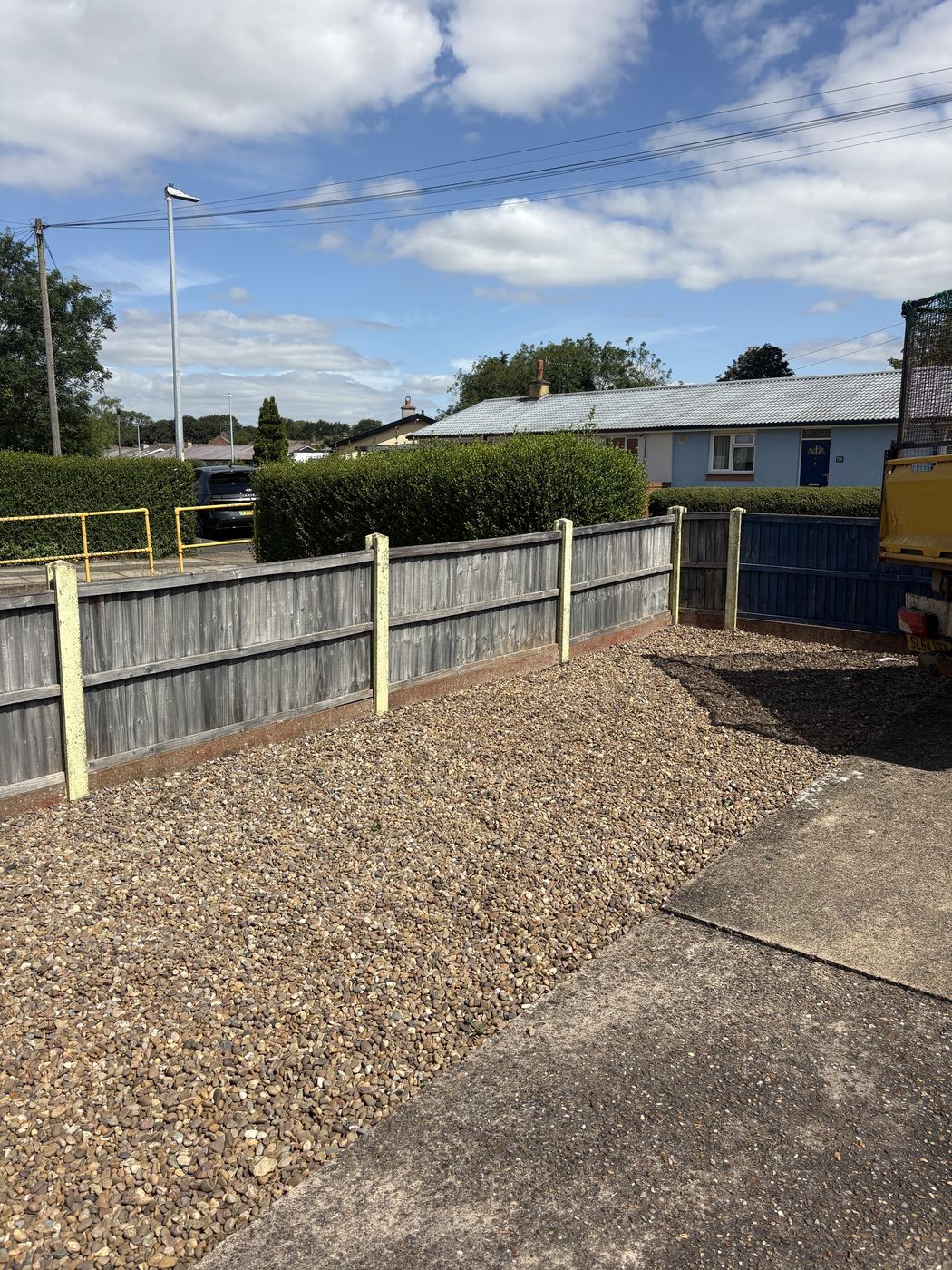The same garden cleared back to gravel, the shed waste and its sub-base removed